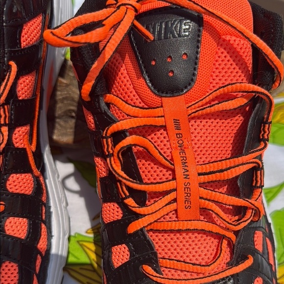 Bold Black and Orange Athletic Shoes with Modern Design main image 6